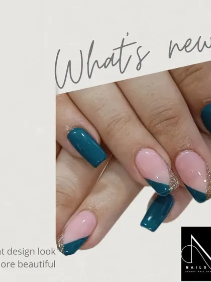 An angular and modern French tip design. We used a deep teal polish to create a sharp, diagonal tip, with one accent nail featuring a gold glitter version of the same design.