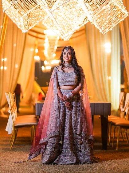 A full-length shot showcasing the complete party look. The makeup, hair, and outfit all come together to create a stunning and cohesive style.