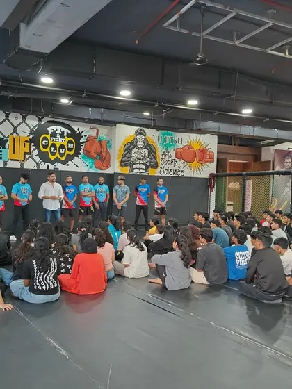 Another angle of our coaches addressing the students during the workshop. We focus on creating an engaging and informative learning environment.