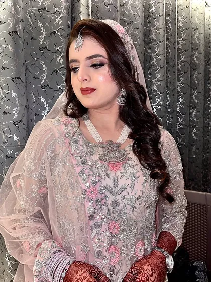 A no-filter bride. This is a personalized, gorgeous makeup look for her big day, featuring a soft yet defined style.