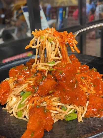 My Chaupal Noodles are a unique creation, featuring noodles tossed in a special sauce. It's a must-try for anyone looking for something different.