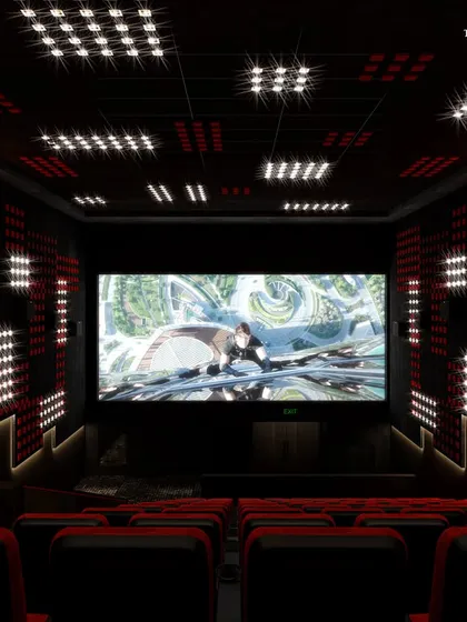 A state-of-the-art private cinema with plush red seating and dramatic wall lighting. The design ensures ultimate comfort and cutting-edge sound and visuals, allowing one to completely immerse in the magic of the big screen.