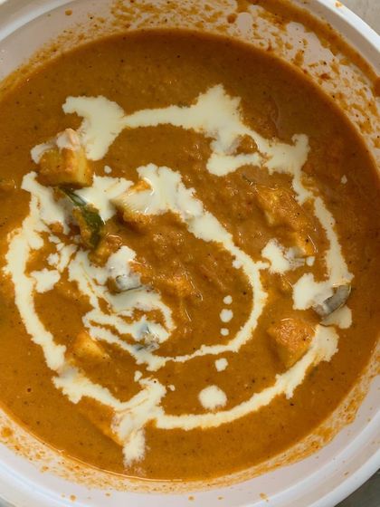 A close-up of a creamy paneer curry.