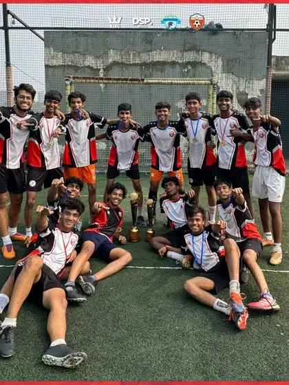 Two trophies, one team. Our U17 squad celebrating a double victory, a testament to their skill and endurance.