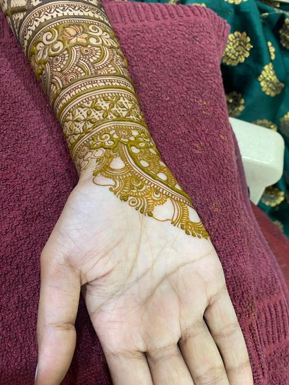 The inside of the arm, showing how the design continues with grace and intricacy. Every part of the arm is a canvas.