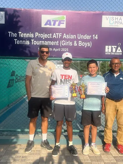 Our player stands with his trophies after a successful week at The Tennis Project ATF Asian Under 14 Tournament, where he placed 3rd in singles and was the runner-up in doubles.