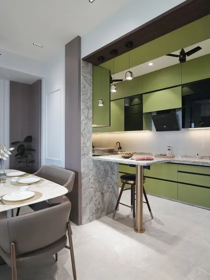 Seen from the dining area, the kitchen becomes an elegant backdrop. The open layout and cohesive design make the space feel larger and more connected, ideal for modern living.