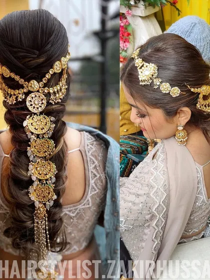 A truly royal bridal braid featuring a heavy, traditional gold hair accessory. This statement piece transforms a simple braid into a work of art, perfect for a grand wedding.
