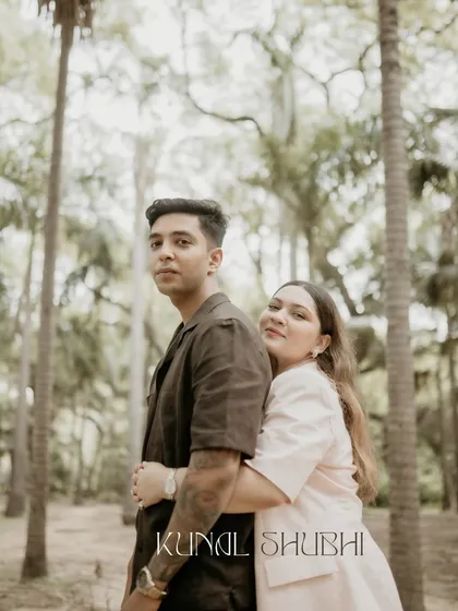 A sweet hug from behind amidst the tall trees. This classic pre wedding pose for Kunal and Shubhi feels both romantic and protective, set against a beautiful natural backdrop.