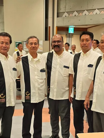 With my fellow referees from the Shorinkan organization. We are responsible for upholding the standards of fair play and proper technique in international competitions.