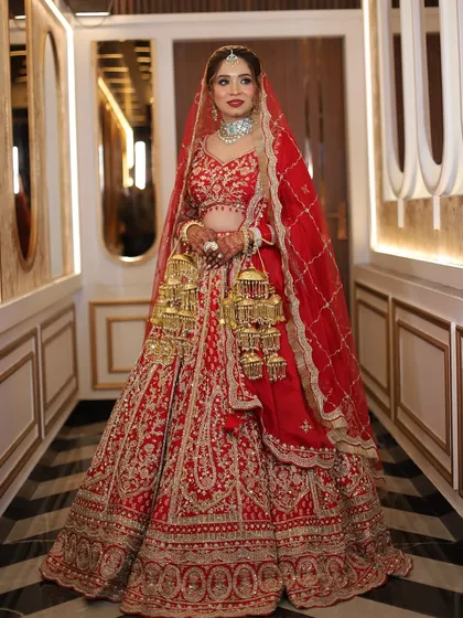 Another full-length view showcasing the entire bridal ensemble. I ensure the makeup ties the whole look together, from head to toe.