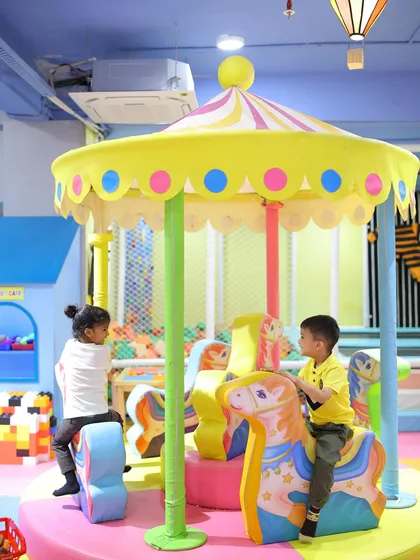 A full view of our charming mini carousel, a centerpiece of gentle fun that kids of all ages adore.