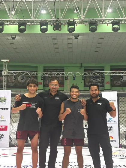 Our fighters and coaches united in victory at a VFC event. We are a team that supports each other inside and outside the cage.