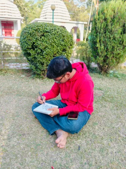 Me, sitting on the grass, live sketching the Jagannath Temple in Bokaro. There's something special about drawing a place while you're right there, soaking in the atmosphere.