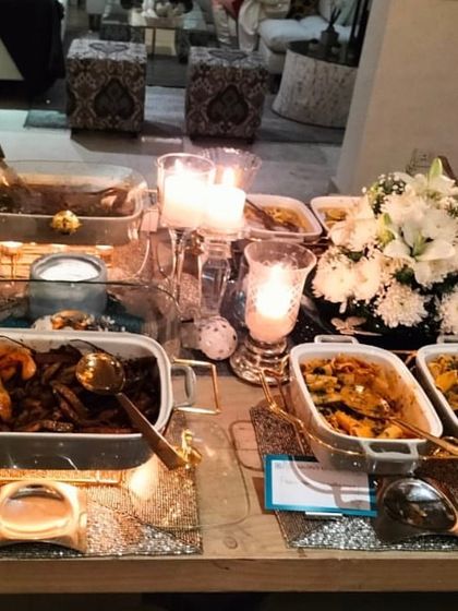 Another angle of the festive Christmas dinner, highlighting the variety of main courses available for guests.