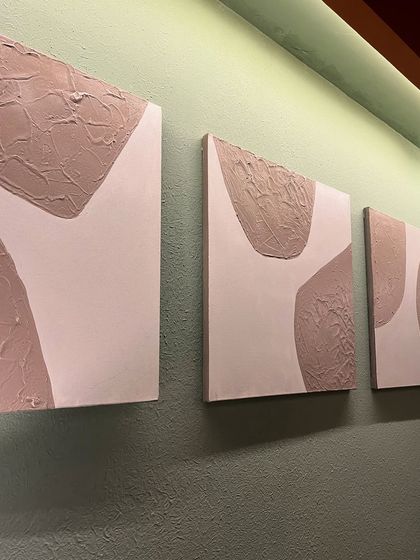 An angled view of the small textured paintings, showing how even on a small scale, the texture adds depth and interest.