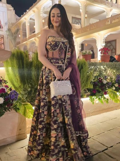 A beautiful floral lehenga for a night event in Jaipur. The intricate design and rich colors were perfect for a royal Rajasthani wedding.