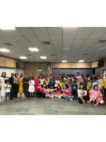 The whole gang together! This group photo includes my team, the kids, and other volunteers, all united by the joy of dance on this special day.