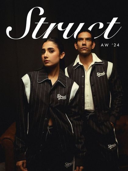 A campaign shot for Struct's pinstripe suiting set. The dark, moody lighting and composition were designed to give the streetwear a polished, high-fashion edge.