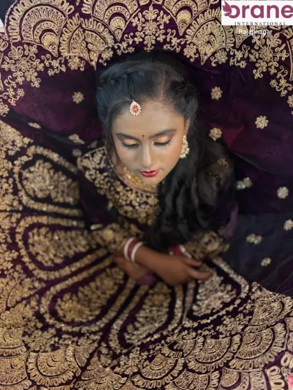 Another beautiful aerial view of the traditional bridal look, highlighting the rich texture and design of the outfit.