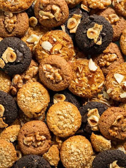 A vibrant mix of assorted cookies, creating a colorful and abundant top-down photograph.
