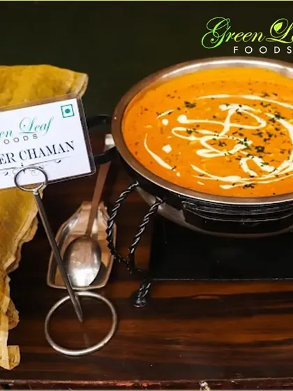Paneer Chaman is a rich and creamy Kashmiri specialty. We prepare it with soft paneer in a tomato and cream-based gravy, garnished with fresh cream and herbs. It's a luxurious addition to any main course menu.