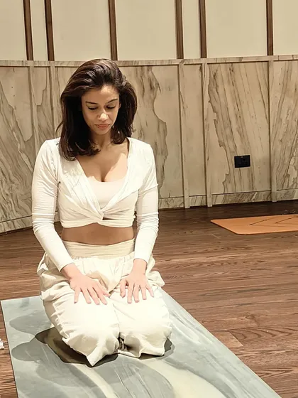 A moment of quiet reflection in Vajrasana (Thunderbolt Pose).