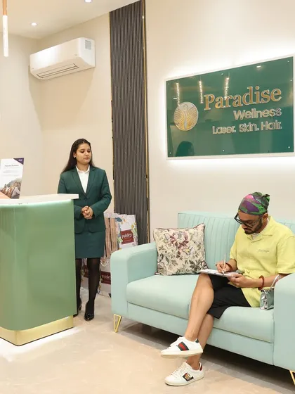 A real-life look at our clinic's reception area, where your journey to glowing skin begins. We've created a calm and stylish space for you to feel comfortable from the moment you walk in.