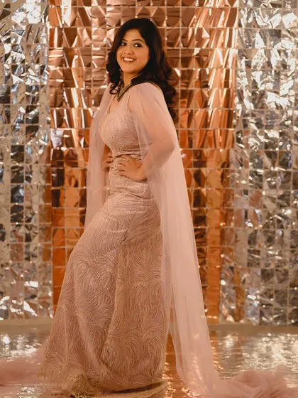 The complete look. This photo showcases the beautiful flow of the gown and how the hair and makeup work together to create a cohesive, stunning look.