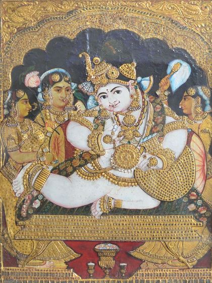An exquisite 20th-century Tanjore painting of 'Navaneetha Krishna,' depicting Balakrishna with a pot of butter. The intricate gold leaf work and use of semi-precious stones are hallmarks of this timeless South Indian art form.