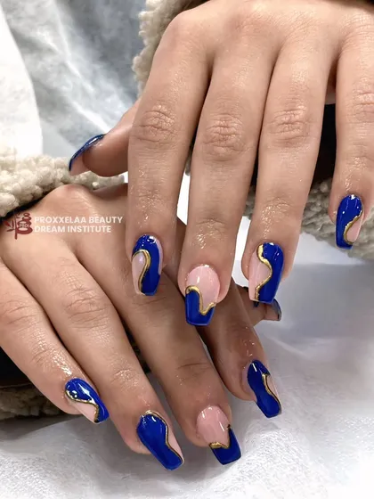 A still image of the modern royal blue and gold design, showcasing the clean lines and the contrast between the bold color and the nude base.