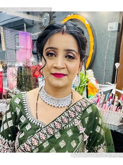 A lovely client ready for a party. Her makeup is soft and elegant, with a beautiful pink lip that matches the details in her saree.