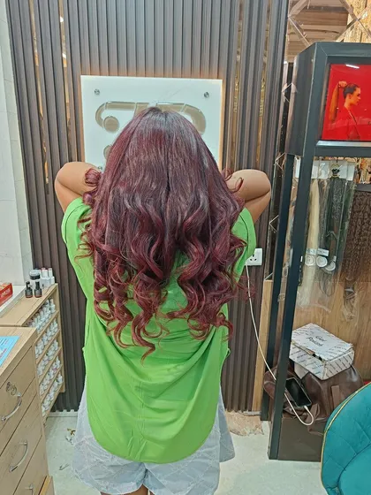 Another pose showing off the gorgeous, uniform red color. We ensure our fashion colors are just as healthy and shiny as our natural shades.