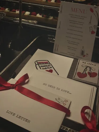 The stationery for the romantic grazing table, including "Love Letter" envelopes and "Perfect Match" cards. These details helped build a narrative of love and romance.