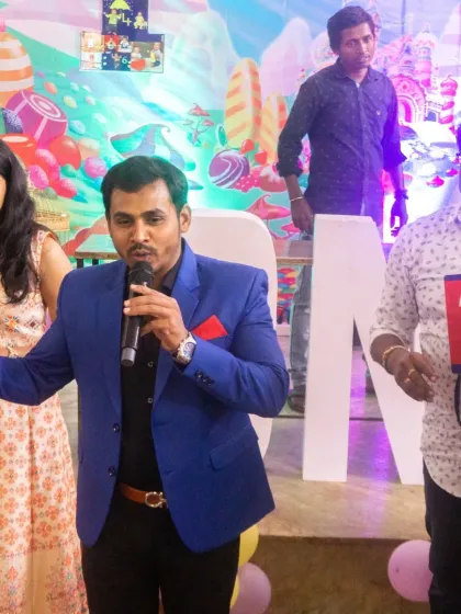 Engaging with guests during a team game at an event at Keys Hotel, Bangalore. Interactive activities are perfect for breaking the ice at family functions or corporate events.