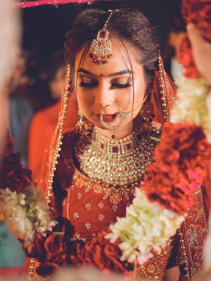 A beautiful shot of the bride during the Jaimala ceremony.