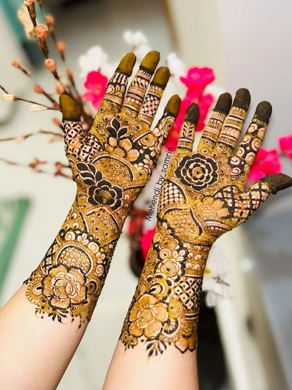 A beautiful non-bridal Indian design with a mix of florals, checks, and leafy patterns. The composition is so balanced and pretty.