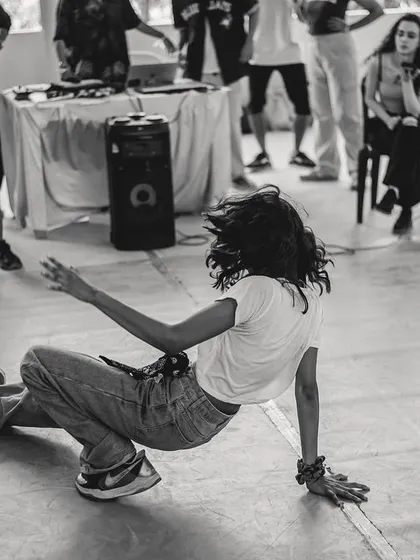 The cypher is where individual style comes alive. This moment from a Spectra dance battle captures the raw energy and freedom of freestyle. It's a space to test your skills, express yourself, and feel the support of the entire community.