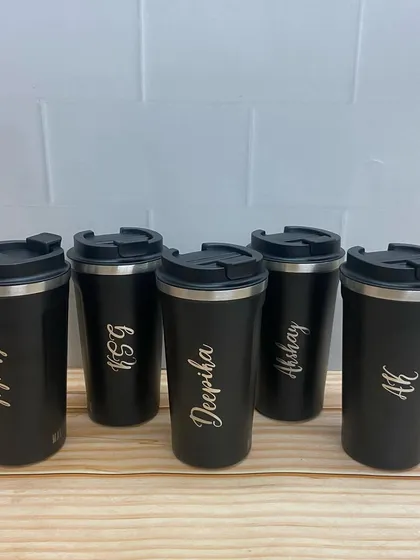 Another set of personalized flasks for the 'Fighter' cast, showcasing the elegant engraving.