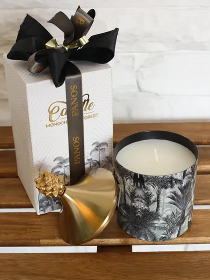 Our Monochrome Forest candle, presented in its elegant gift box. The combination of the sophisticated print and luxurious packaging makes it a standout gift.