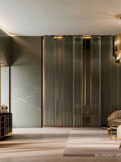 This image highlights the use of reeded glass panels with gold trim as a room divider. This feature provides a sense of separation while allowing light to pass through, adding to the room's elegant and airy feel.