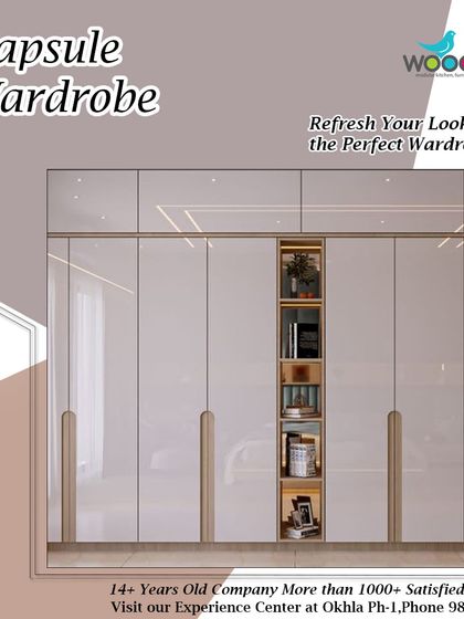 A well-designed wardrobe is the foundation of a great capsule collection. This design features a glossy white finish with an open shelf.