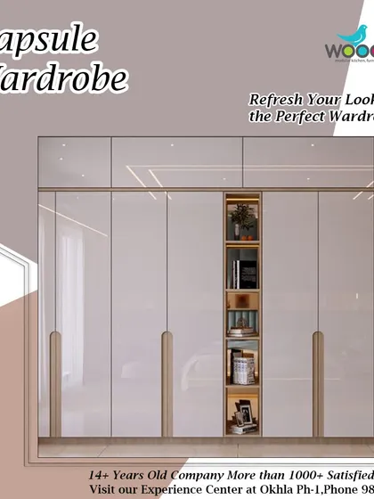 A capsule wardrobe needs a smart home. This design features high-gloss white doors with a central open shelf in a warm wood finish, perfect for displaying your favorite items.