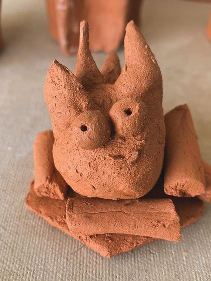 A whimsical creature sculpted by a student. It’s a perfect example of how pottery can be a playful escape from stress and pressure.