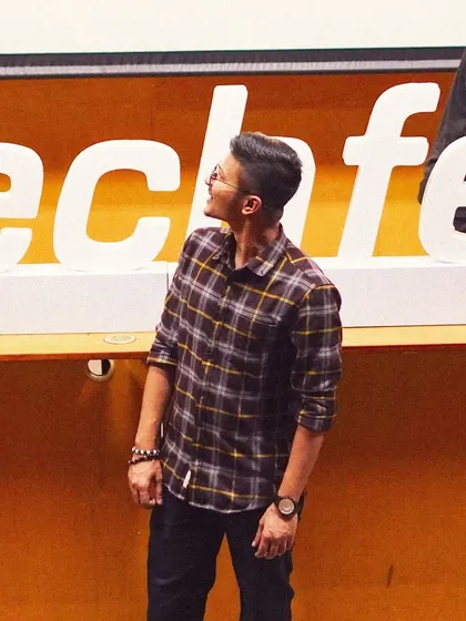 Looking up at the Techfest sign. A moment of reflection on my journey and how far I've come as an artist.