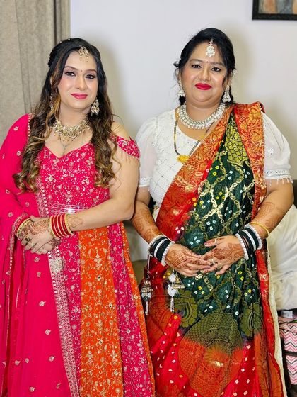 Another shot of the two clients, their outfits complementing each other.