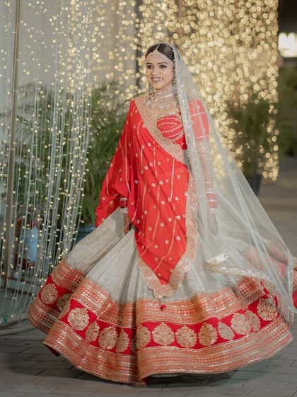 Another angle of this stunning bridal lehenga, showing how the makeup complements the traditional yet modern outfit.