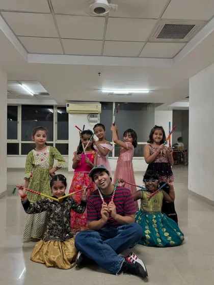 This is my 'Chotu Gang' after a super fun Garba and Dandiya workshop. Teaching kids is pure therapy for me, and I love seeing them embrace folk dance styles with so much enthusiasm.
