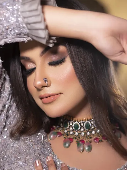 A close-up of this soft glam, smoked-out look. Notice the seamless blending on the eyes and the dewy, real-skin finish. Achieving this "glass skin" effect without looking heavy is a core part of my makeup philosophy.