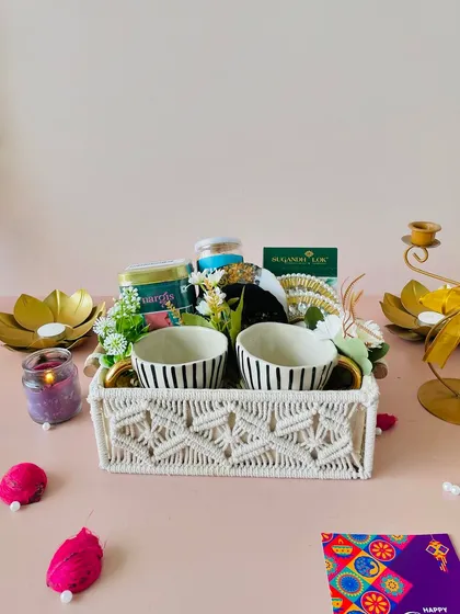 The macrame tray hamper set against a festive background. It’s a complete and elegant gift solution for Diwali.